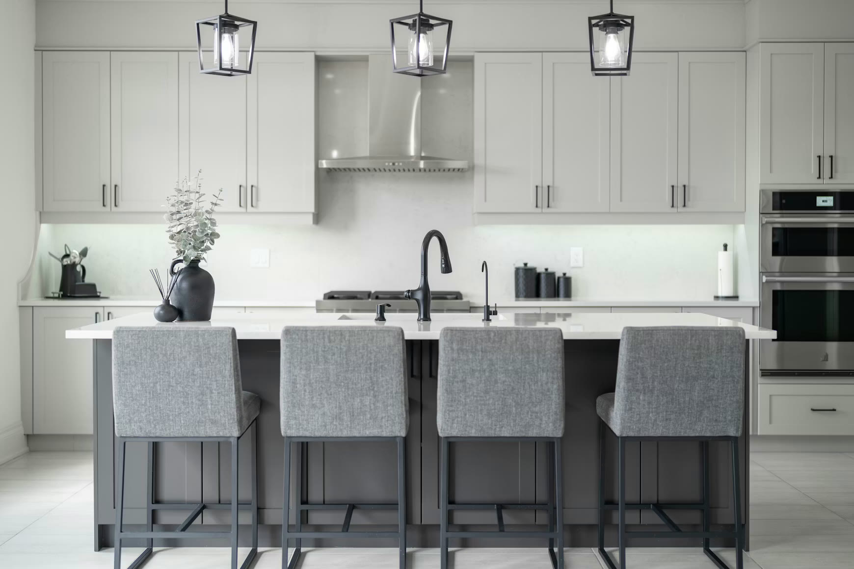 Kitchen remodel with open permit documentation on counter — Massachusetts